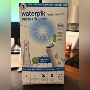 Waterpik water flosser, brand new unopened, model 240502BT cordless rechargeable